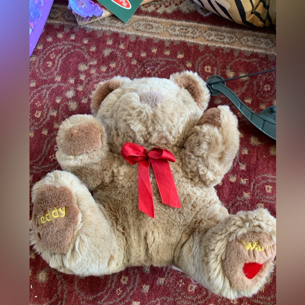 Plush Teddy Bear with Red Bow